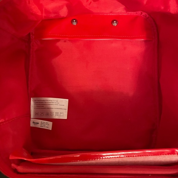 Hello Kitty 12” tall suitcase with wheels. - Picture 8 of 12